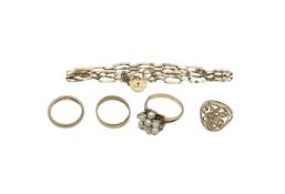 An 18ct gold wedding band and four more