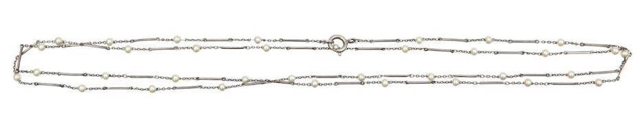 A Continental silver bead guard chain
