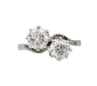 A two stone diamond cross over ring