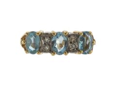An 18ct diamond and aquamarine dress ring