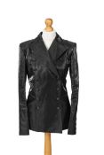 A Chanel black trouser suit