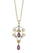 An Edwardian 15ct gold, amethyst and seed pearl pendant