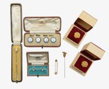A collection of 9ct gold tie and dress pins