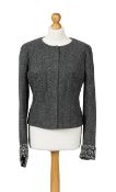 A Chanel 'La Petite Veste Noire' herringbone jacket