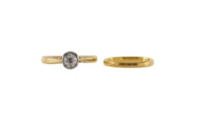 An 18ct gold old cut diamond solitaire ring and band