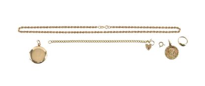 A collection of gold pendants, rings and bracelets