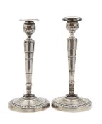 A pair of silver plated candlesticks