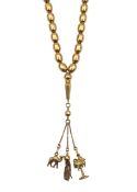 A necklace with tassel and charms