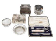 A collection of silver dressing table items