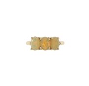 A 10ct gold three stone opal ring