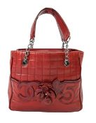 A Chanel 'Camellia No. 5' burgundy calfskin handbag