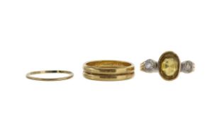 A citrine, a diamond and an 18ct gold wedding band