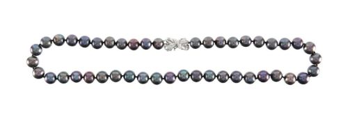 A diamond clasped string of black cultured pearls