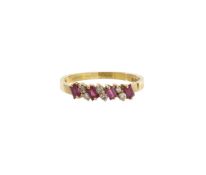 An 18ct gold, ruby and diamond dress ring