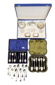A Continental silver cased cruet and flatware