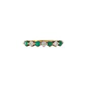 An emerald and diamond eternity band