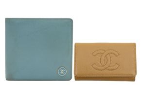 A Chanel beige caviar key wallet and a Chanel wallet