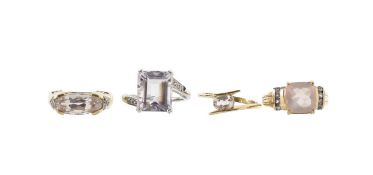 A 9ct white gold rose de France amethyst and white topaz ring, and three others