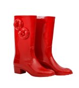 A pair of Chanel red wellington boots