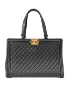 A Chanel 'Boy' black calfskin hand bag