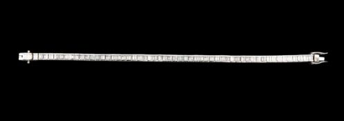 A 4ct baguette cut diamond set tennis bracelet