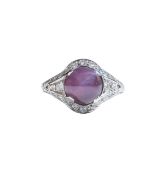 An Art Deco star ruby diamond and platinum ring