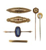 A collection of Victorian pins and brooches