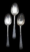 A group of three George III Old English pattern serving spoons