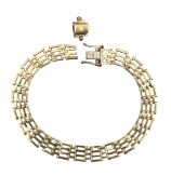 A 9ct gold four bar gate bracelet