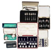 Eight cased sets of silver and flatware