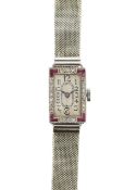 A gem-set and white gold lady's wristwatch