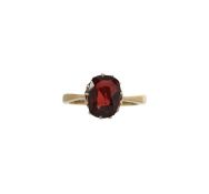 A Victorian garnet dress ring