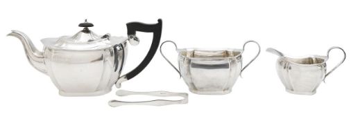 A George V silver three piece tea service and George III tongs