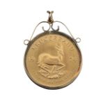 A South Africa 1974 Krugerand in 9ct gold pendant mount
