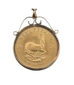 A South Africa 1974 Krugerand in 9ct gold pendant mount