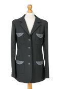 A Chanel black skirt suit