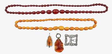 Two amber necklaces, and two amber pendants,