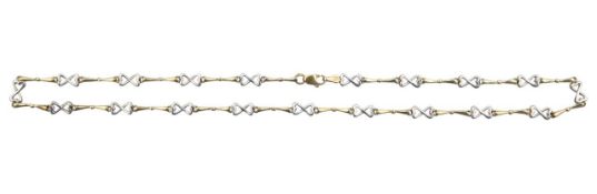 A 9ct 'hearts and bow' fancy link necklace