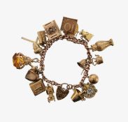 A 9ct charm bracelet with half sovereign coin