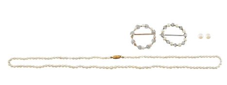 An Edwardian diamond and pearl brooch, pearl earrings, pearl necklace and one other