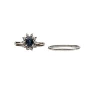 A diamond and sapphire cluster ring with wedding band