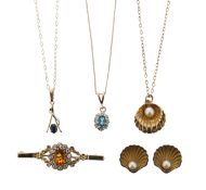 A 9ct gold scallop shell and pearl necklace with matching ear rings and three more