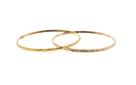 Two circular stiff bright cut bangles