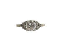 An Art Deco diamond solitaire ring with stepped diamond setting