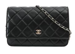 A Chanel Classic 'Wallet on Chain' black lambskin cross-body bag