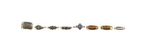 A collection of 9ct gold diamond set rings and wedding bands