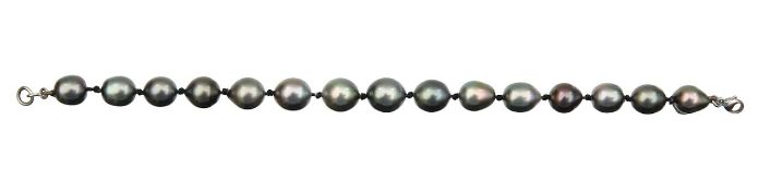 A bracelet of Tahitian cultured black pearls