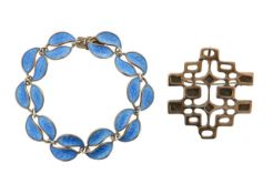 A David Andersen silver and enamelled bracelet and a brooch