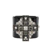 A Chanel cross wide cuff bracelet