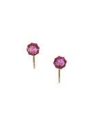 A pair of ruby single stone earrings
